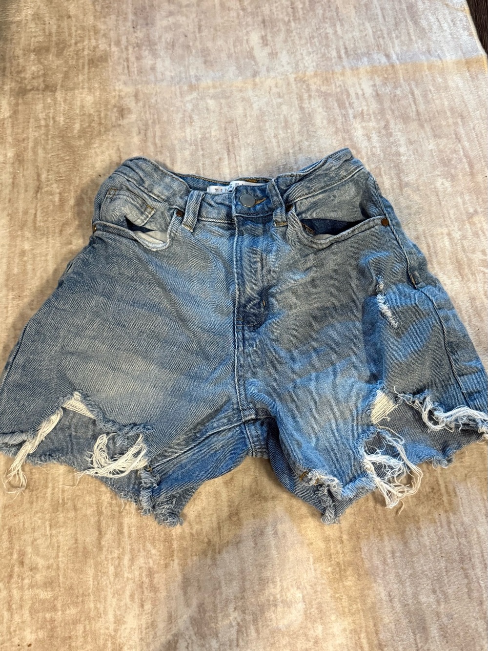 High-Rise Distressed Denim Shorts